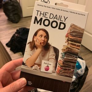 The daily mood.  Flip top desk accessory.